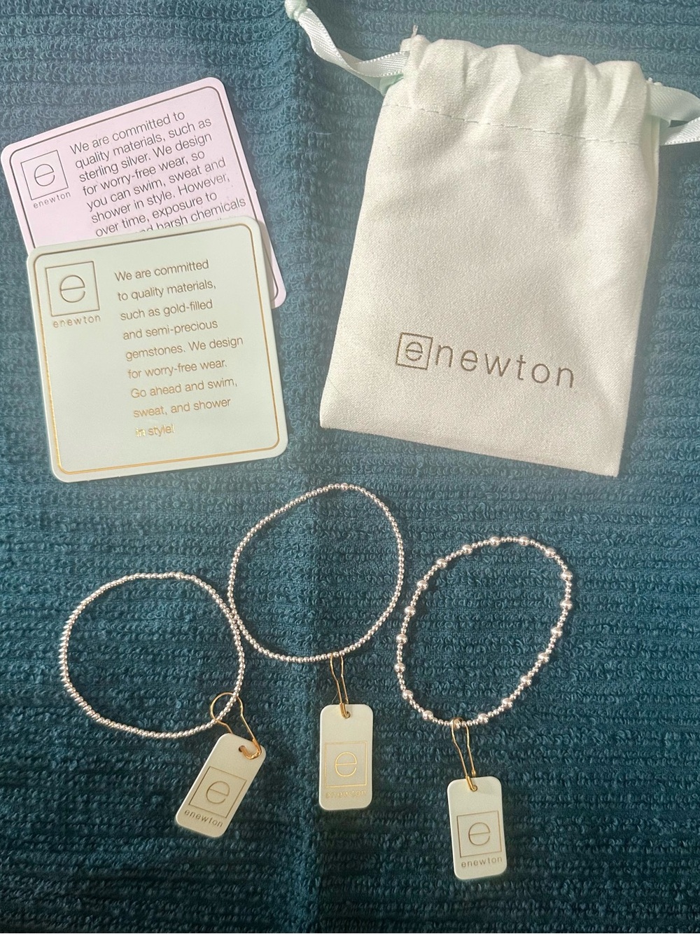 e Newton Silver Beaded Bracelet with Branded Tag